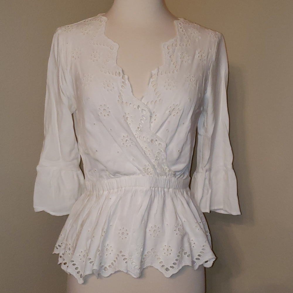Express cream colored ladies blouse